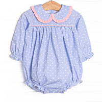  This bubble features periwinkle polka dots, a Peter Pan collar, and pink trim. 