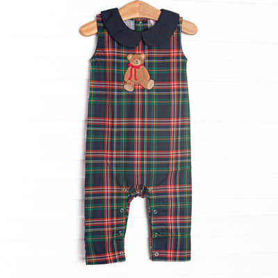 This Jon Jon features navy plaid material, a teddy bear applique, a navy Peter Pan collar, and snaps along the stride to make changing a breeze.