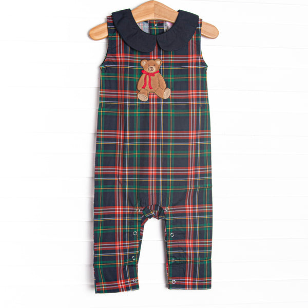 This Jon Jon features navy plaid material, a teddy bear applique, a navy Peter Pan collar, and snaps along the stride to make changing a breeze.