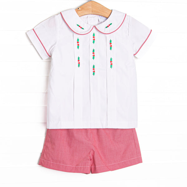  This set features a white top, red mini gingham shorts, a white Peter Pan collar, and holly embroidery. 