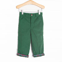 These pants features a green corduroy fabric, a red and green plaid trim, and belt loop details.