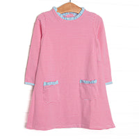  This dress features medium pink stripes, front pockets, and blue ruffle trim. 