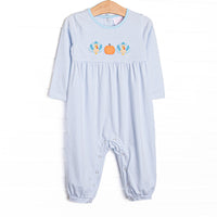 This romper features light blue striped knit fabric, pumpkin and turkey applique, and snaps along the stride to make changing a breeze