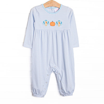 This romper features light blue striped knit fabric, pumpkin and turkey applique, and snaps along the stride to make changing a breeze