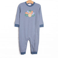 This romper features a navy striped knit material, snaps on the stride, and a turkey applique.
