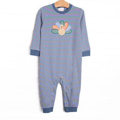 This romper features a navy striped knit material, snaps on the stride, and a turkey applique.