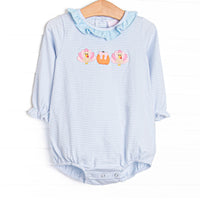 This bubble features light blue striped knit fabric, pumpkin and turkey applique, and a ruffle collar.