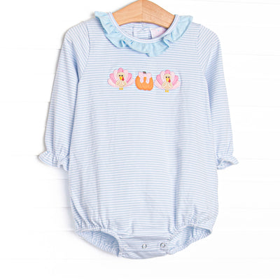 This bubble features light blue striped knit fabric, pumpkin and turkey applique, and a ruffle collar.