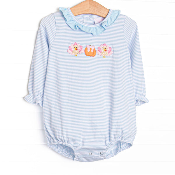 This bubble features light blue striped knit fabric, pumpkin and turkey applique, and a ruffle collar.