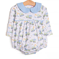 This bubble features a construction print, blue peter pan collar, and snaps on the stride to make changing a breeze.