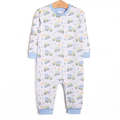  This romper features a construction print, blue trim, and snaps on the stride to make changing a breeze. 