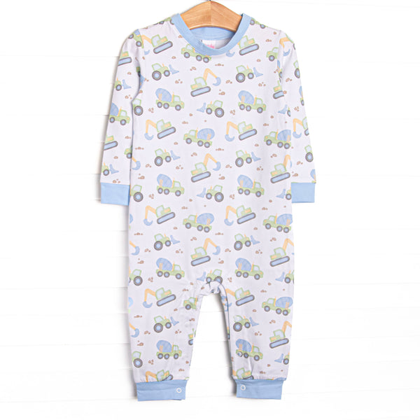  This romper features a construction print, blue trim, and snaps on the stride to make changing a breeze. 