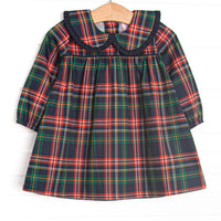 This dress features navy tartan plaid print, a plaid Peter Pan collar, and long sleeves.