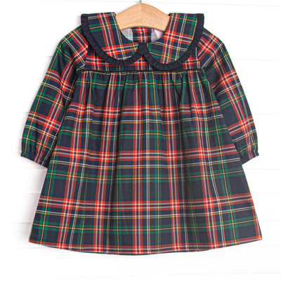 This dress features navy tartan plaid print, a plaid Peter Pan collar, and long sleeves.