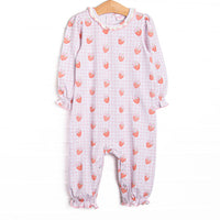 This romper features pink gingham and strawberry printed fabric, a white ruffle collar, and snaps along the stride to make changing a breeze.
