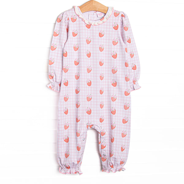 This romper features pink gingham and strawberry printed fabric, a white ruffle collar, and snaps along the stride to make changing a breeze.