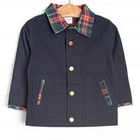 This coat features navy corduroy fabric, a plaid tartan polo collar, front brass snaps, plaid elbow patches, and pockets.