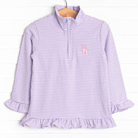  This pullover features purple stripes, ruffle trim, and a ballet slipper embroidery. 