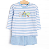 This set features a blue striped top, amusement park applique, and blue shorts.