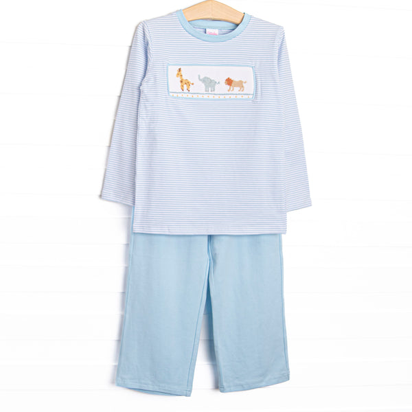 This set features blue striped fabric, jungle animal smocking, and long sleeves. Coordinating blue pants to match.