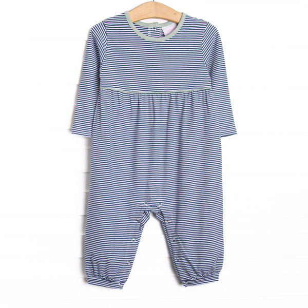 The Romper features long sleeves, snaps in the stride to make changing a breeze, and soft knit material.