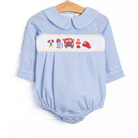  This bubble features a blue mini gingham fabric, fire truck and puppy smocking, and a blue mini gingham Peter Pan collar. 