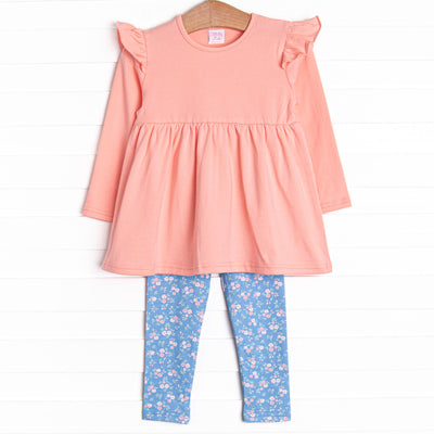 This set features a long sleeve pink knit top with shoulder ruffles and blue floral knit leggings to match.