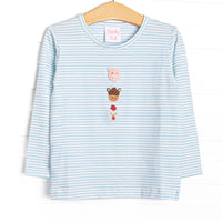  This top features a blue striped print, long sleeves, and a trio of farm animal embroideries. 