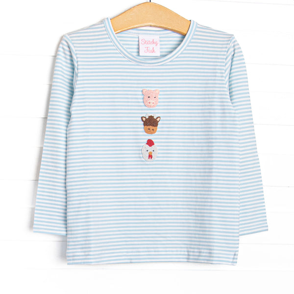  This top features a blue striped print, long sleeves, and a trio of farm animal embroideries. 