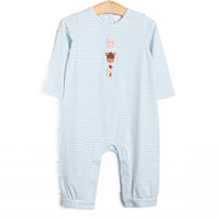  This romper features a blue striped print, snap on the stride, and a trio of farm animal embroideries. 