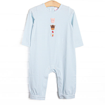 This romper features a blue striped print, snap on the stride, and a trio of farm animal embroideries. 
