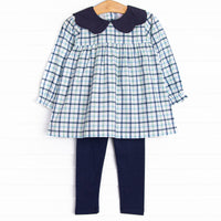 This set features a blue plaid print, a navy blue scalloped edged collar, and navy leggings