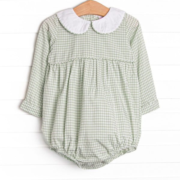  This bubble features a green gingham print, a peter pan collar, and snaps on the stride. 