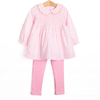  This set features a pink floral print, a scallop Peter Pan collar, and smocking on the chest. Coordinating pink leggings to match. 