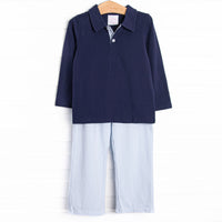 The set features soft knit material, a navy blue polo long sleeve top and coordinating blue striped pants.