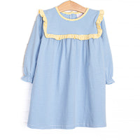 Featured here in medium blue stripes and with yellow ruffle trim! 