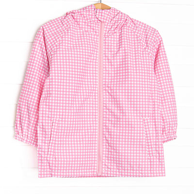 This jacket features pink gingham waterproof material, a full-length zipper, front pockets, and a hood to keep your little one dry.