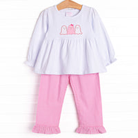 This set features a long sleeve top with a ruffle trim and trio of ghosts applique. Coordinating pink gingham ruffle pants to match.