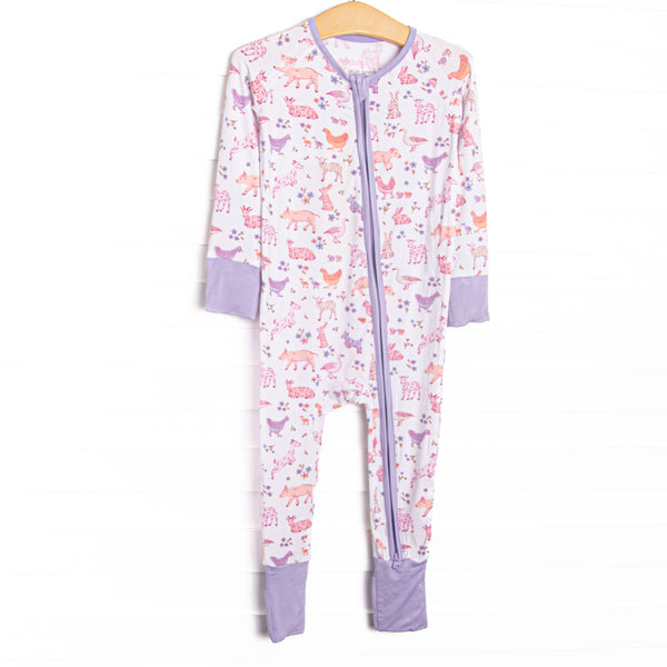 This zippy is made of the extremely soft, stretchy bamboo viscose fabric that feels like butter. With fold over cuffs at the feet so it can be worn as a romper or a zippy, a double zipper for easier diaper changes, and a magical animal print