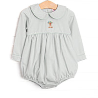  This bubble features green striped fabric, a Rudolph embroidery, and a Peter Pan collar. 