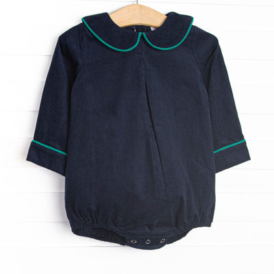 This bubble features a blue corduroy material, a peter pan collar, and green trim.