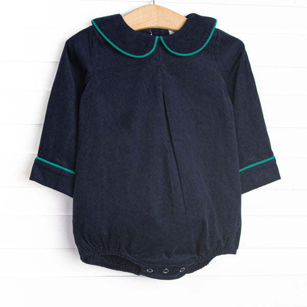 This bubble features a blue corduroy material, a peter pan collar, and green trim.