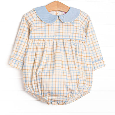 This bubble features a blue plaid print, blue peter pan collar, and blue trim.