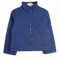 Quilted details, a full-length zipper for easy use and front pockets to keep little hands warm.