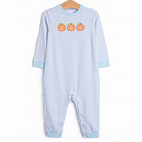 This romper features a blue striped print, snaps on the stride, and a trio of pumpkins appliques.