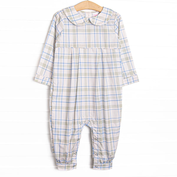 This romper features sage and blue plaid fabric, a Peter Pan collar, and snaps along the stride to make changing a breeze.