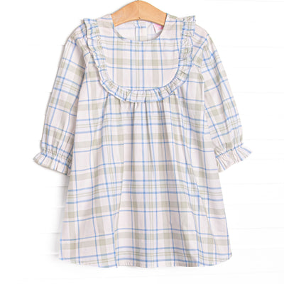 This dress features sage and blue plaid fabric, ruffle chest trim, and long sleeves