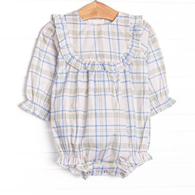  This bubble features sage and blue plaid fabric, ruffle chest trim, and long sleeves. 