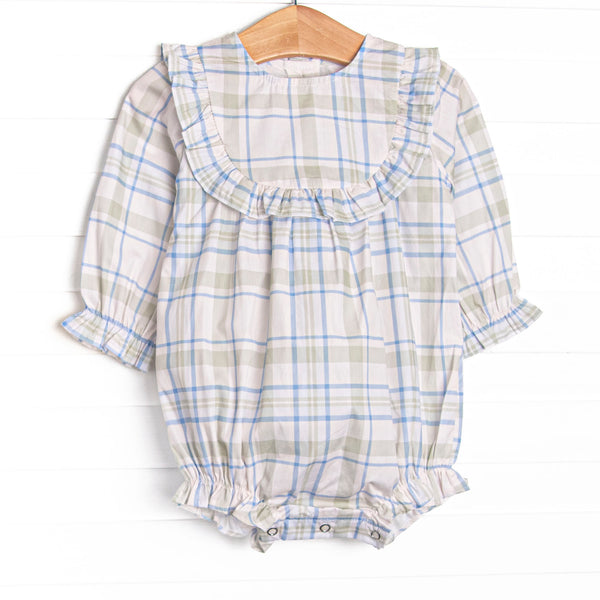  This bubble features sage and blue plaid fabric, ruffle chest trim, and long sleeves. 