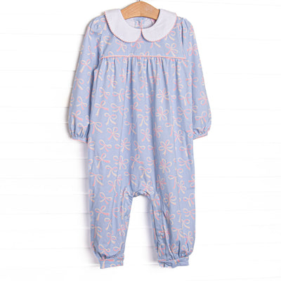  This romper features a bow print, a peter pan collar, picot trim, and snaps along the stride to make changing a breeze. 